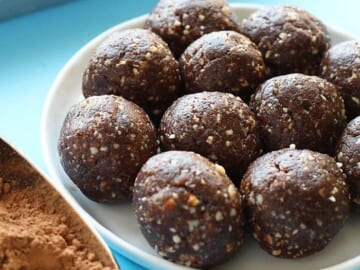 Peanut butter chocolate energy balls on a plate.