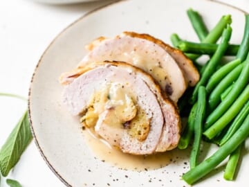 Stuffed Turkey Breast with Cranberry Stuffing with green beans.