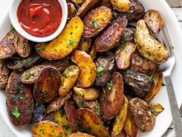 bowl of fingerling potatoes and ketchup.