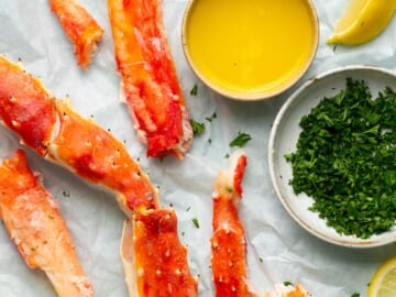 King Crab Legs with butter and lemon wedges