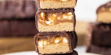 Peanut butter bars stacked on top of each other.