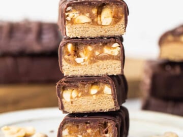 Peanut butter bars stacked on top of each other.