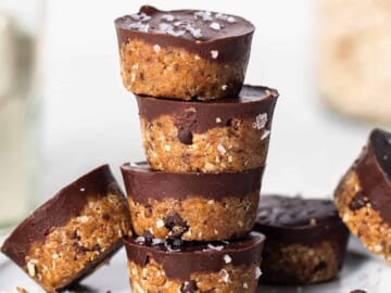 A stack of chocolate oatmeal cups on a plate.