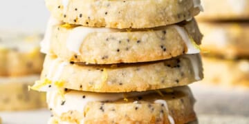 Lemon poppy seed cookies with icing and sprinkles.