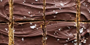 A close up of chocolate bars with sprinkles on them.