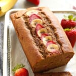 Strawberry banana bread with strawberries and bananas.