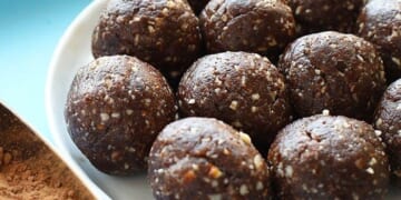 Peanut butter chocolate energy balls on a plate.